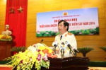 Đồng chí Trần Công Phàn, Phó Viện trưởng VKSNDTC trình bày báo cáo tóm tắt tổng kết công tác của ngành KSND năm 2013