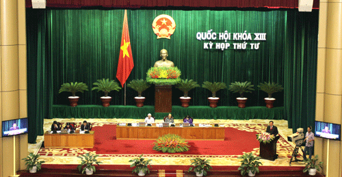 Đ/c Nguyễn Hòa Bình, Ủy viên TW Đảng, Viện trưởng VKSND tối cao  trình bày báo cáo tại kỳ họp thứ Tư, Quốc hội khóa XIII